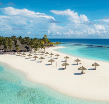 Long sand bank of Veligandu Maldives Resort island